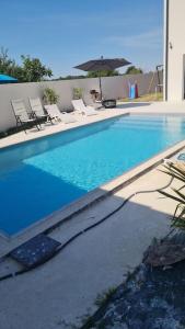 Villas magnifique villa avec piscine et spa : photos des chambres