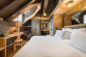 Les Chalets du Grand Hotel du Soleil d'Or : photos des chambres