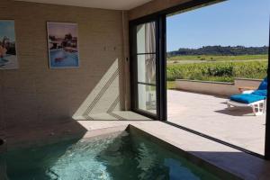 Villas Villa Luxe piscine interieure SPA chauffee vue exceptionnelle sur vignoble : photos des chambres