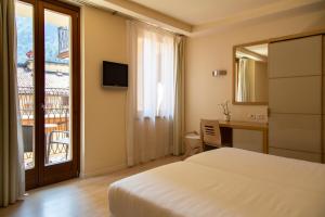 Quadruple Room with Balcony room in Hotel Antico Borgo
