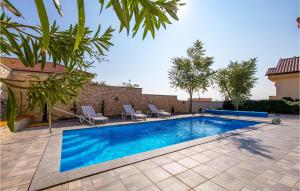 Awesome Apartment In Barbat Na Rabu With Outdoor Swimming Pool, 3 Bedrooms And Wifi