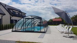 Osada Wypoczynku Jantar Luksusowe Domki z Basenem Sauną i Jacuzzi