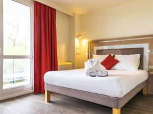 Hotels Novotel Senart Golf De Greenparc : photos des chambres