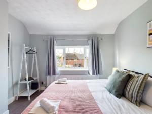 Stunning Family Home with Comfortable Surroundings by Our Home Short Stays ideally situated within Greater Manchester