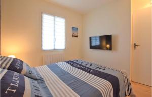 Appartements Amazing apartment in Cabourg with 1 Bedrooms and WiFi : photos des chambres