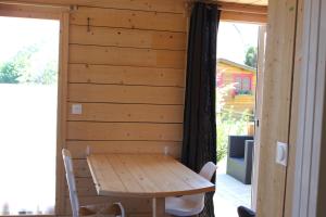 Appartements Tiny house dans jardin arbore : photos des chambres