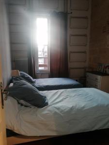 Appartements A DEUX PAS : photos des chambres