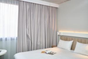 Hotels Ibis Annecy - Cran-Gevrier : photos des chambres