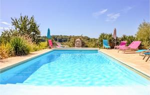 Maisons de vacances Awesome home in Saint-Sauveur-Lalande with Outdoor swimming pool, WiFi and 3 Bedrooms : photos des chambres