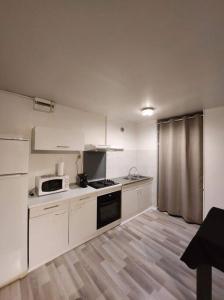 Appartements Appartement cosy et chaleureux : photos des chambres
