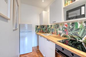 Appartements Ambiance Jungle et Cocon en hyper centre pour 2, 4 ou 6 pers - MyLittleStay : photos des chambres