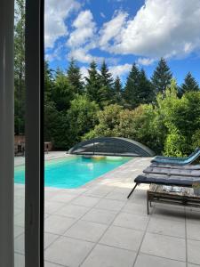 Jolie studio avec Piscine et Sauna dans la verdure