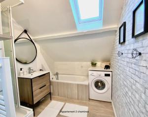 Appartements chaleureux - 15 min a pied de la gare : photos des chambres