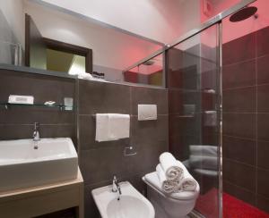 Triple Room with Balcony room in ACasaMia WelcHome Hotel