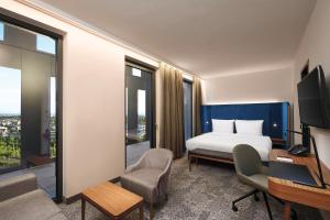 Studio with Balcony room in Hyperion Hotel München