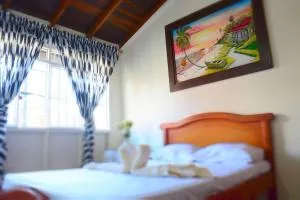 Casa familiar y agradable, parqueadero y BBQ - Piamonte