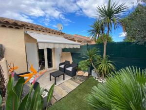 Maisons de vacances Mazet de vacances en duplex avec jardin acces piscine proche de Saint Tropez : photos des chambres