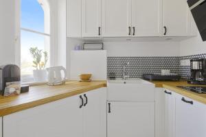 Appartements Studio Limpo - Welkeys : photos des chambres