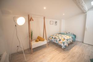 Appartements KASA LORETTE - TV WIFI & Cosy : photos des chambres