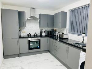 Beautiful and Homely 3 Bed House With FREE Parking So Close To Man City and City Centre