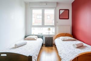 Appartements Le vintage - Wifi - Parking gratuit : photos des chambres