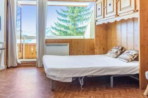Appartements Cosy ski-out studio with balcony in L'Alpe d'Huez - Welkeys : photos des chambres