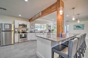 Canalfront Retreat with Fire Pit and Boat Dock!