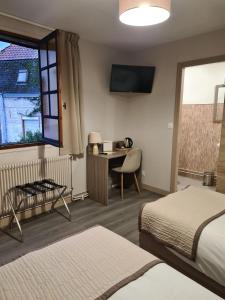 Hotels Au Lion d'or : photos des chambres