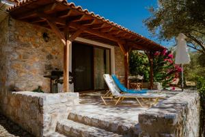 Beautiful Traditional Stone House in the private Sea Front Olive Grove of Elaionas Nikou Luxury Villas
