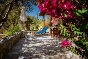 Beautiful Traditional Stone House in the private Sea Front Olive Grove of Elaionas Nikou Luxury Villas