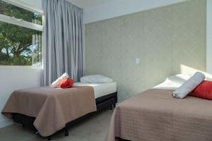 Solar de Bombinhas 202 – Localização Privilegiada e Ótimo Custo-Benefício a 30m da Praia.