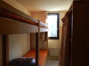 Appartement cosy au pied des pistes avec balcon, ascenseur, casier à skis et parking gratuit - FR-1-557A-36