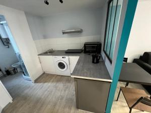 Appartements La Pause - studio en ville : photos des chambres