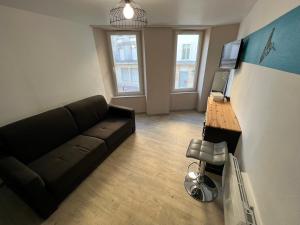 Appartements La Pause - studio en ville : photos des chambres