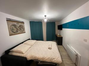 Appartements La Pause - studio en ville : photos des chambres