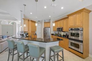 Home with poolspa, ping pong and steps to beachfood