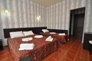 Standard Triple Room room in Omega Hotel