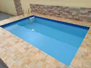 Casa em Condomínio com Piscina Privativa - Regamê