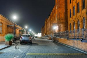 Lumina Loft Tymienieckiego with a view of the lake