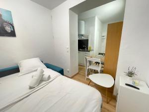 Appartements Rollin 7 YourHostHelper : photos des chambres