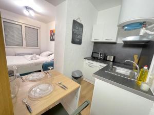 Appartements Rollin 7 YourHostHelper : photos des chambres