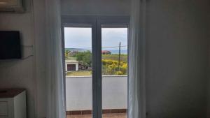 Apartment in Ljubac with sea view, balcony, air conditioning, WiFi 809-3