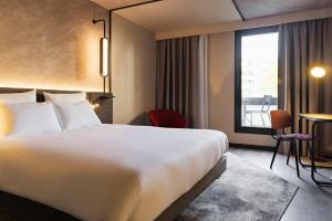 Hotels Novotel Paris Suresnes Longchamp : photos des chambres