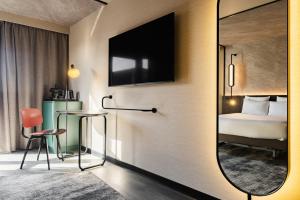 Hotels Novotel Paris Suresnes Longchamp : photos des chambres