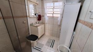 Praia do Tombo - Apto Completo com Garagem, Wi-fi e Ar Condicionado