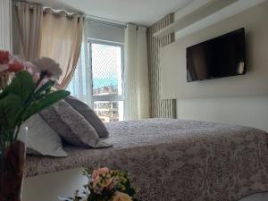 Apê estilo Resort c pé na areia e vista mar, próximo ao Beto Carrero