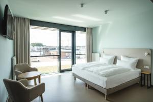Double room with Trave view room in aja Travemünde
