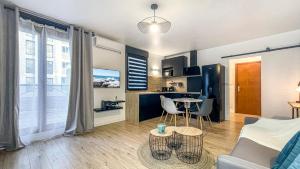 Appartements HOMEY HELSINKI - Hyper centre - Proche Geneve - Terrasse privee - Wifi & Netflix : photos des chambres