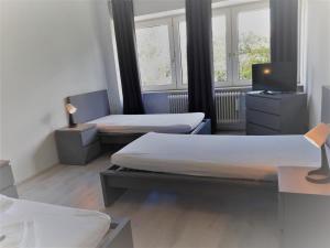 Mehrbett-Apartment 7 Citynah, einfache Ausstattung