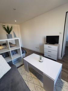 Appartements Le Cozy - Hyper centre - Calme - Moyenne duree : photos des chambres